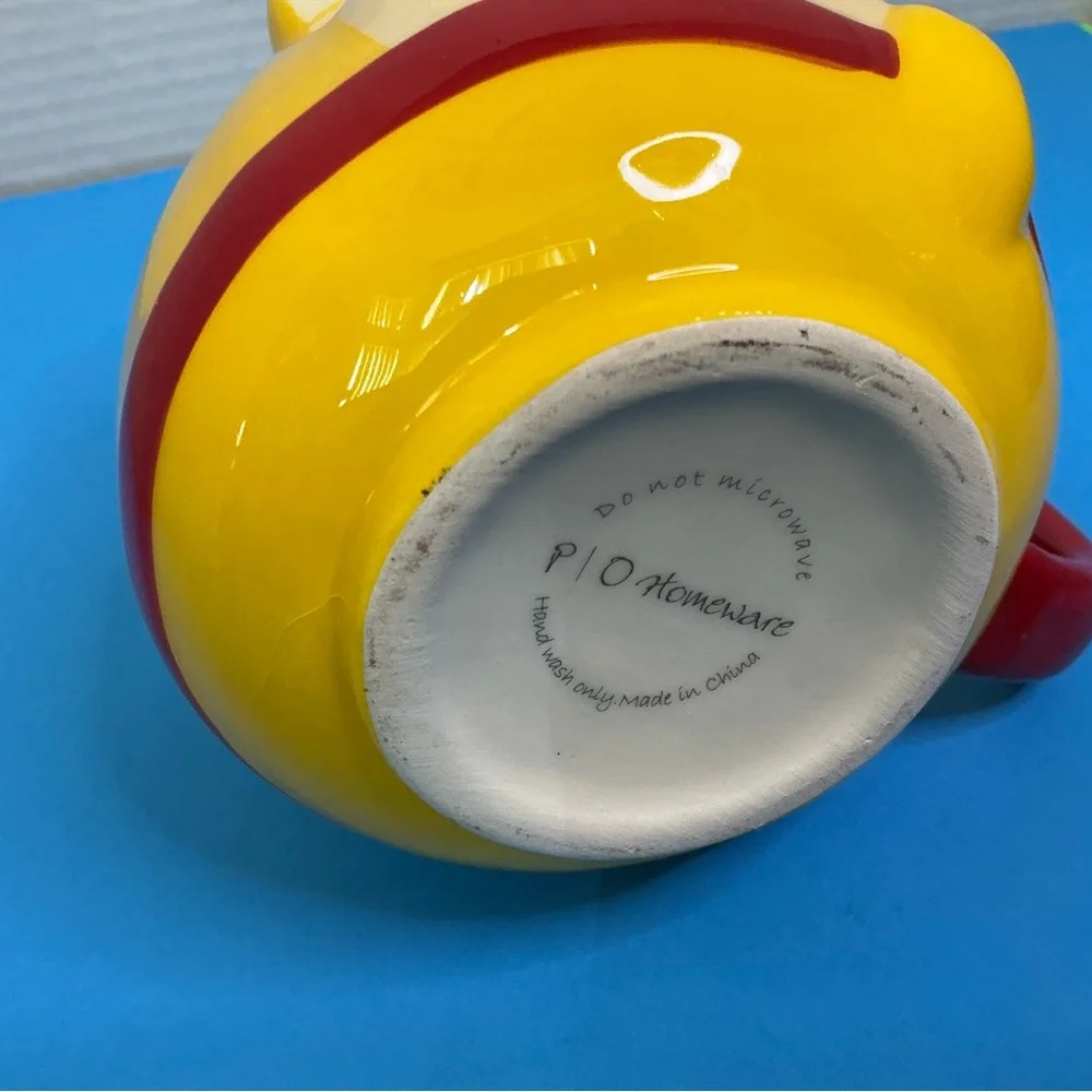 Playful Yellow Cat Face Ceramic Mug with Red Handle